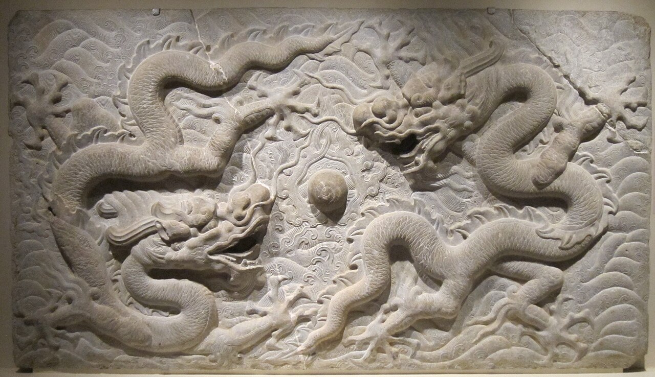 Chinese temple dragon relief showing rain and authority symbolism