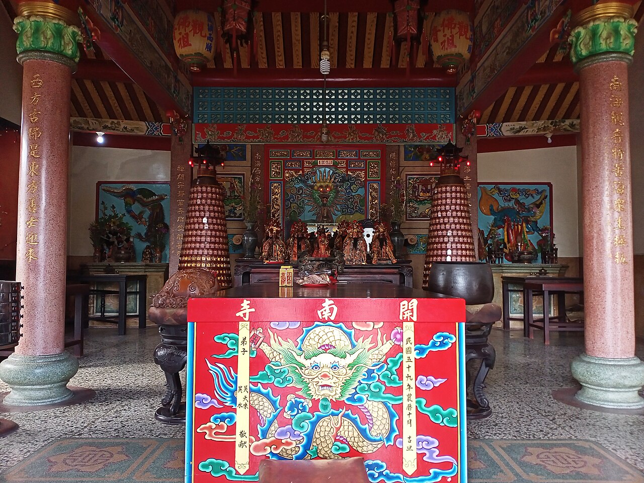 Nezha mythology story opening image with a Nezha statue, temple art, or deity context